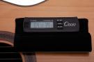 Hygrometer holder for mounting on guitar