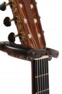 Guitar stand with auto grab system