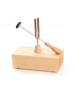 Tuning fork on wooden resonance case